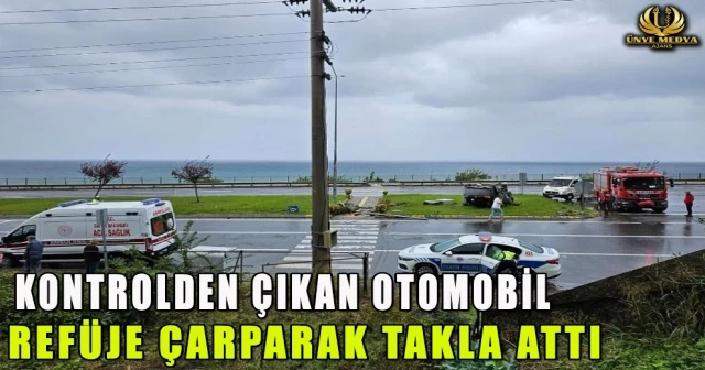 KONTROLDEN ÇIKAN OTOMOBİL REFÜJE ÇARPARAK TAKLA ATTI